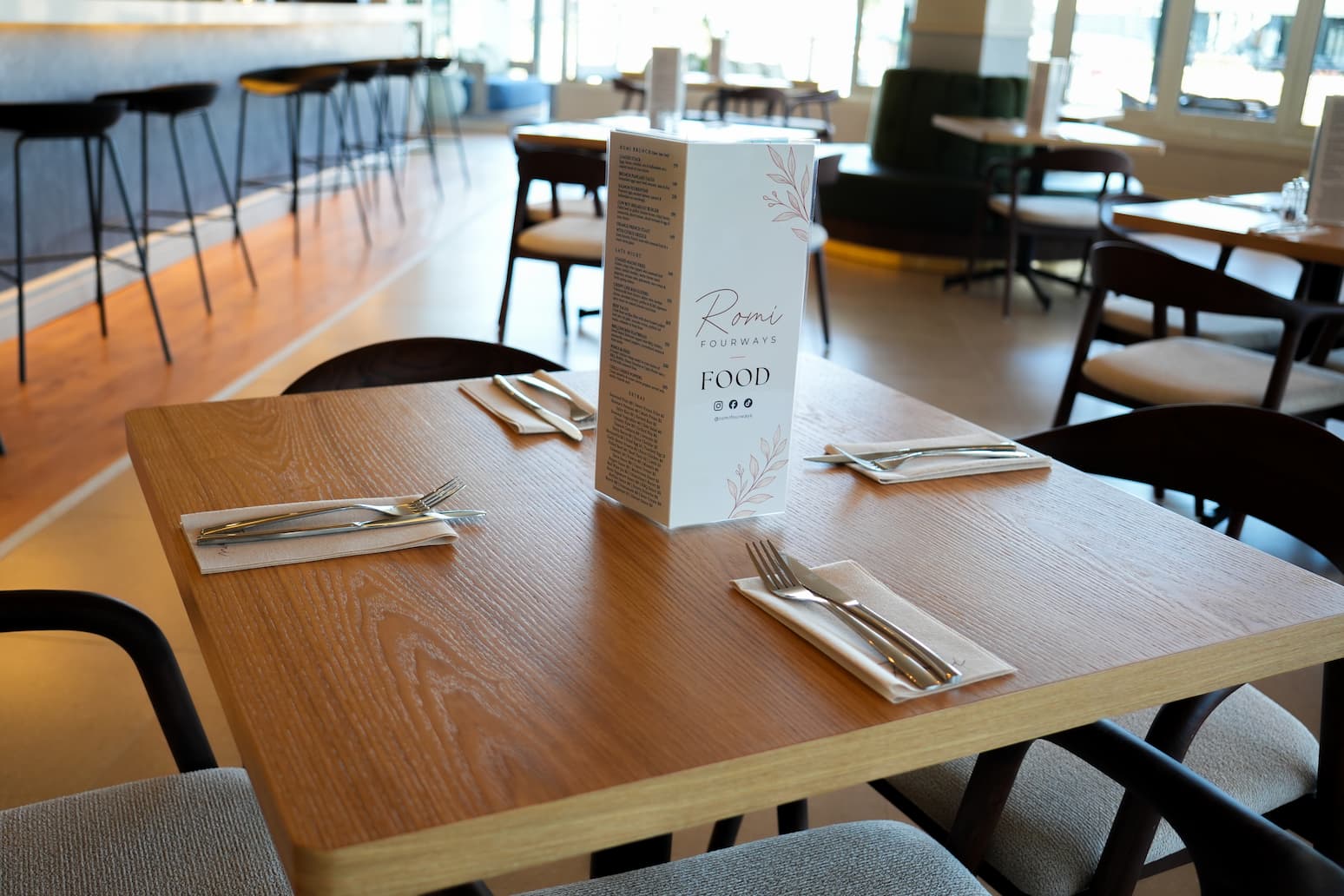 A set table inside Romi Fourways